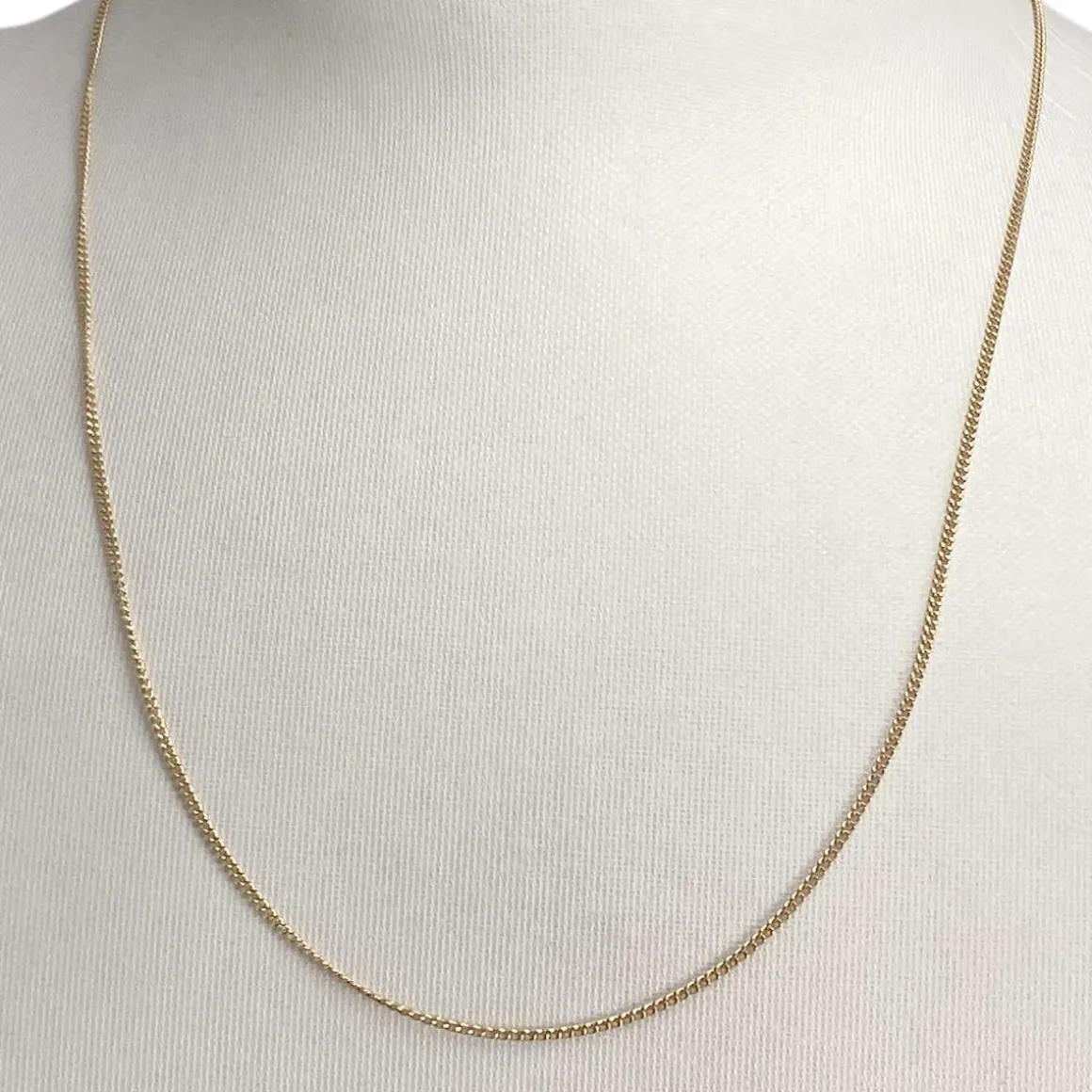Chaîne d'occasion or 750 jaune maille gourmette 47 cm