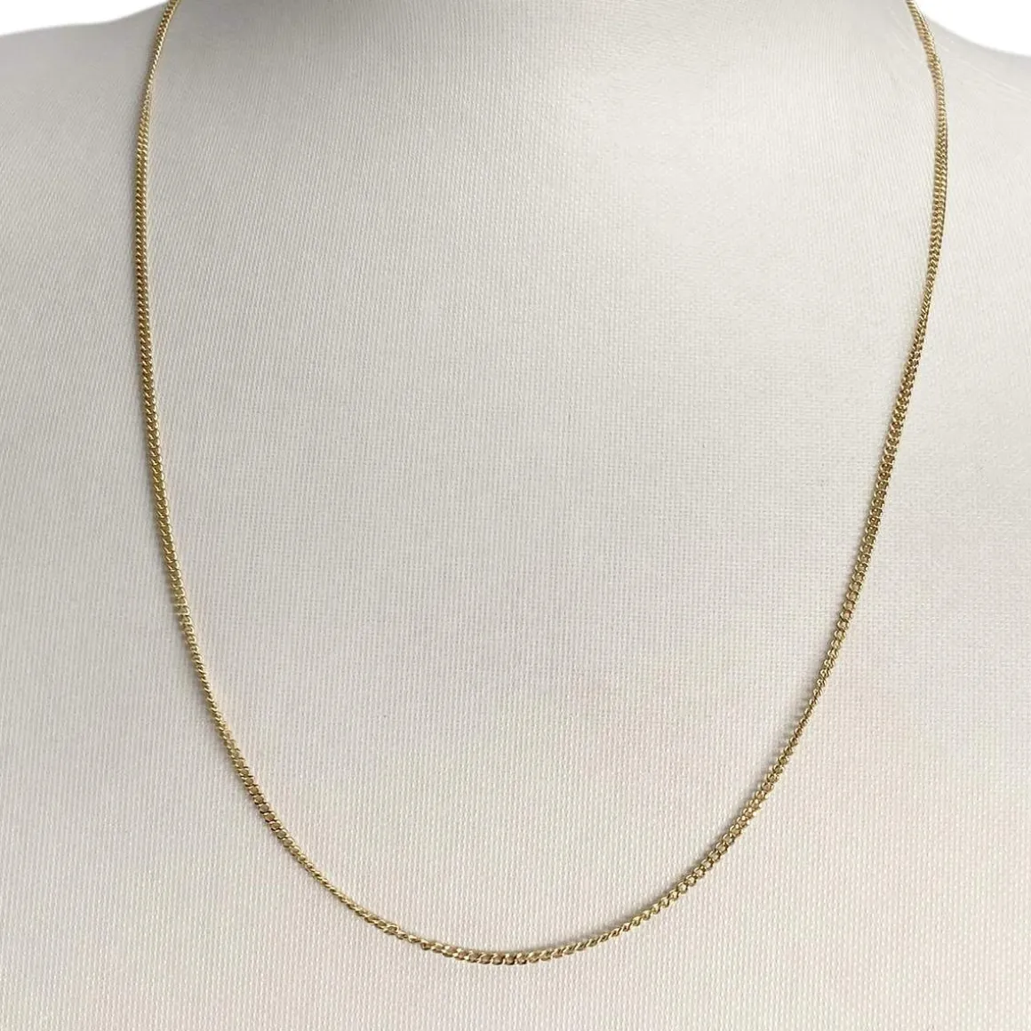 Chaîne d'occasion or 750 jaune maille gourmette 52.5 cm