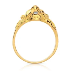 Chevalière or 750 jaune tête de lion rubis et diamant