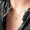 Collier argent 925, perle de culture de Chine et zirconia. Longueur 45 cm.