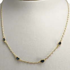 Collier d'occasion or 750 jaune maille cheval saphir