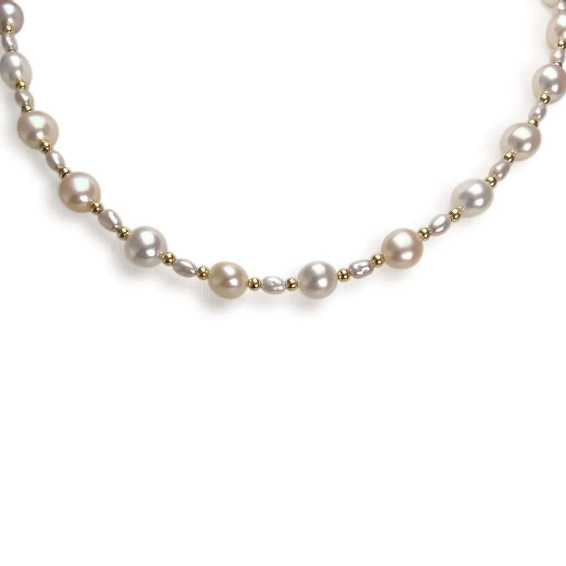 Collier d'occasion or 750 jaune perles de culture de chine 40 cm.