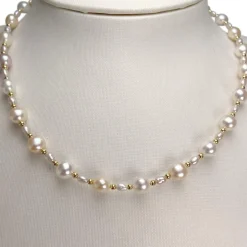 Collier d'occasion or 750 jaune perles de culture de chine 40 cm.