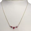 Collier d'occasion  or 750 2 tons maille forçat rubis diamants