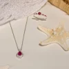 Collier or 750 blanc rubis taille poire et diamants 42 cm