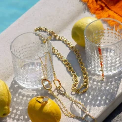 Collier plaqué or anneaux laque orange 70cm