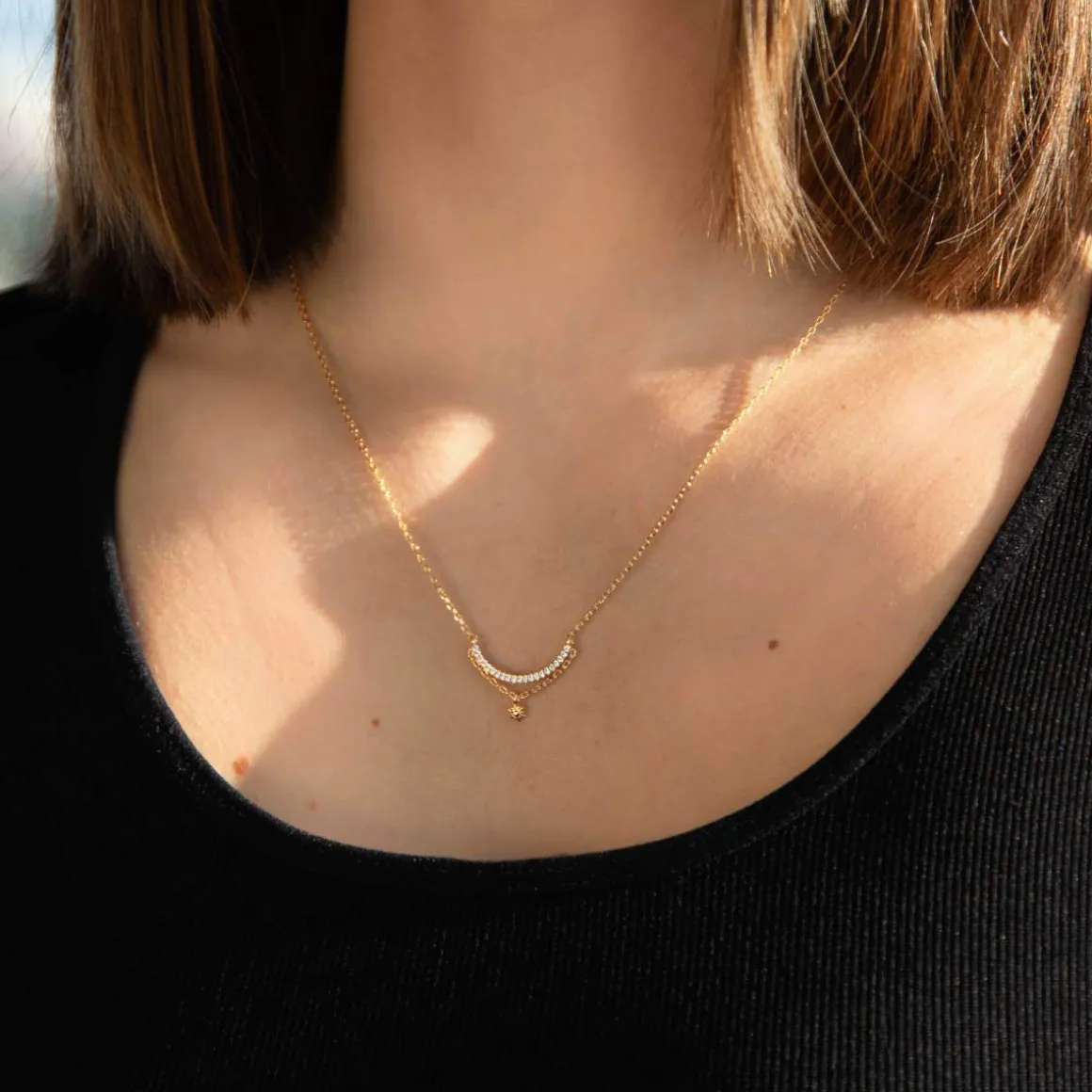 Collier plaqué or zirconias 45 cm motif soleil