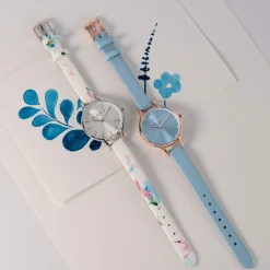 Montre femme dorée rose bracelet cuir bleu ciel