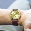 Montre homme acier doré bracelet cuir marron