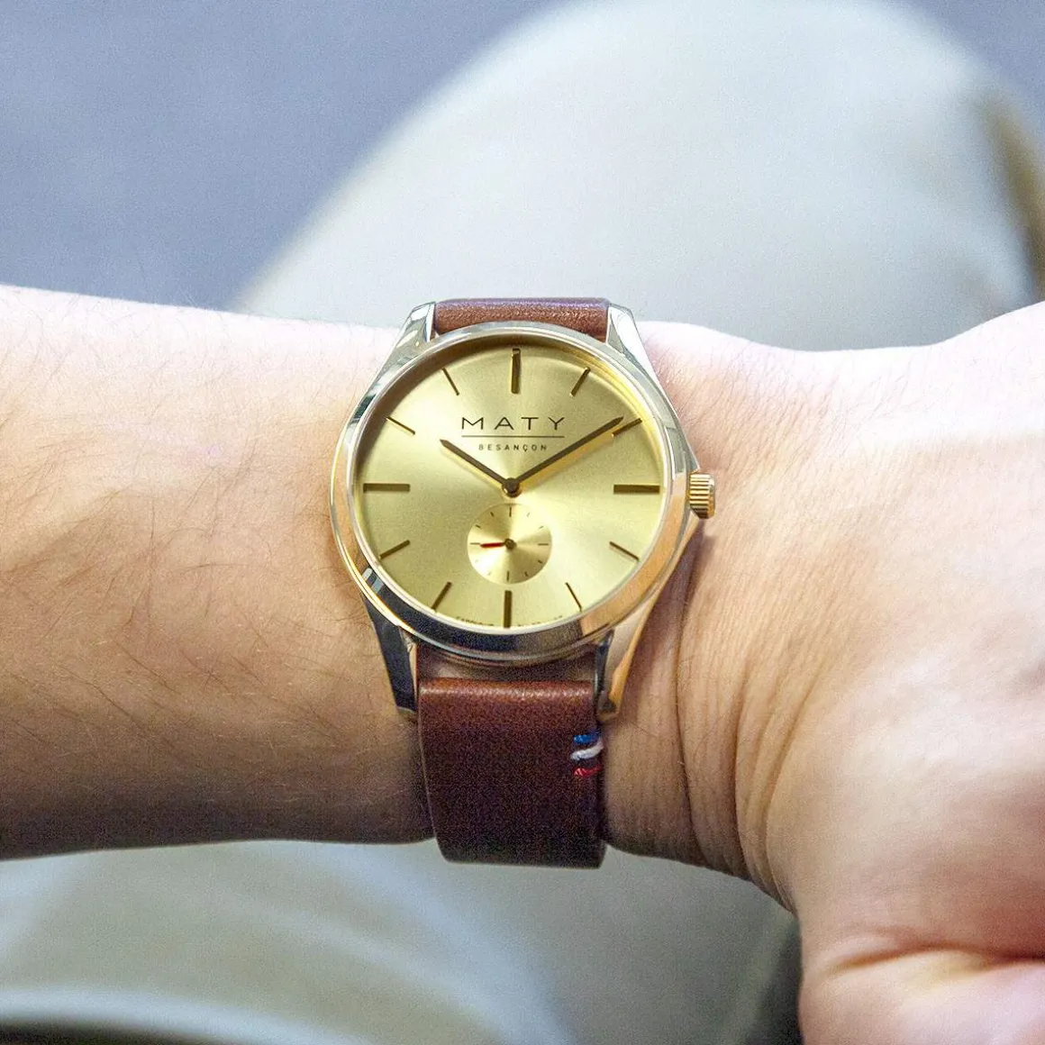 Montre homme acier doré bracelet cuir marron