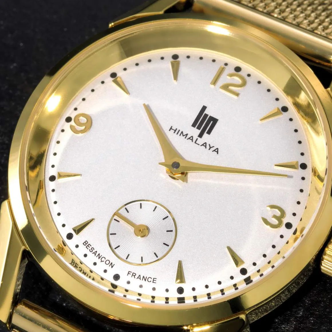 Montre Lip femme acier doré