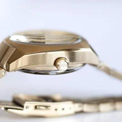Montre mixte automatique acier doré bracelet acier doré