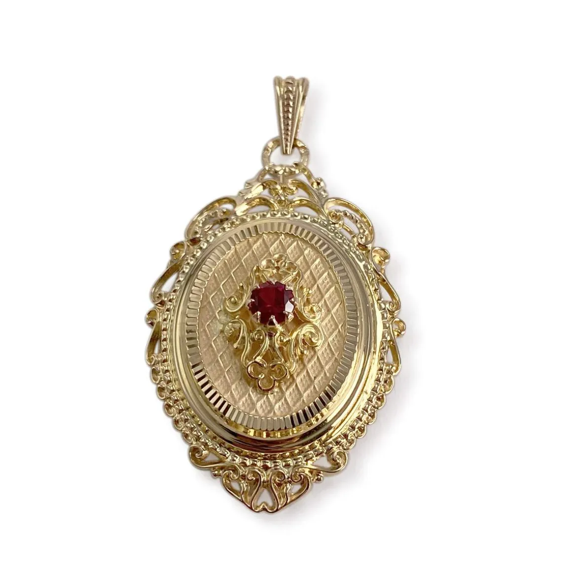 Pendentif d'occasion or 750 jaune rubis synthetique