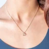 Pendentif or 375 2 tons diamant motif coeur